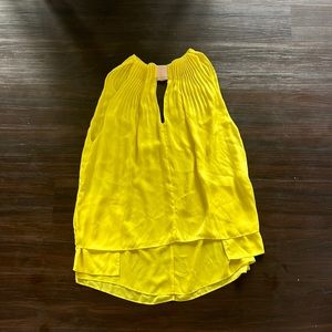 Yellow blouse, sleeveless with front pleating, lightweight